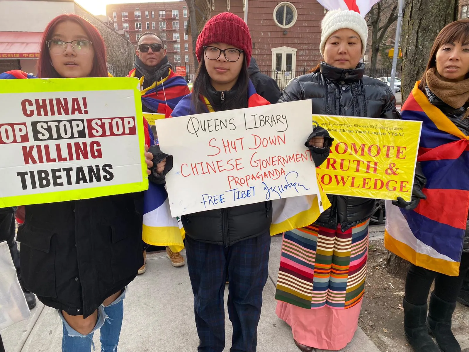 TIBET ACTIVISTS PROTEST CHINESE CONSULATE TIBET EXHIBIT AT THE QUEENS PUBLIC LIBRARY