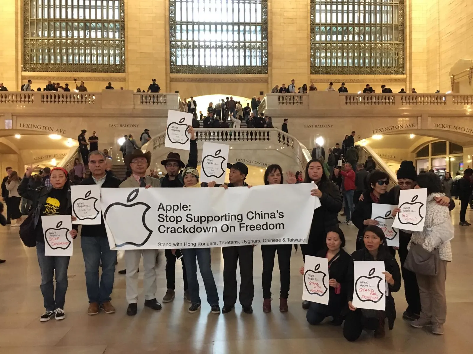Rights Activists Protest Outside Apple Store in Grand Central Station Over Complicity in China's Crackdown on Freedom