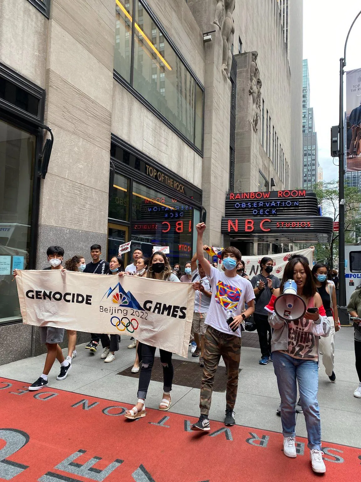 ACTIVISTS CONDUCT FLASHMOB PROTEST AT NBC’S ROCKEFELLER CENTER