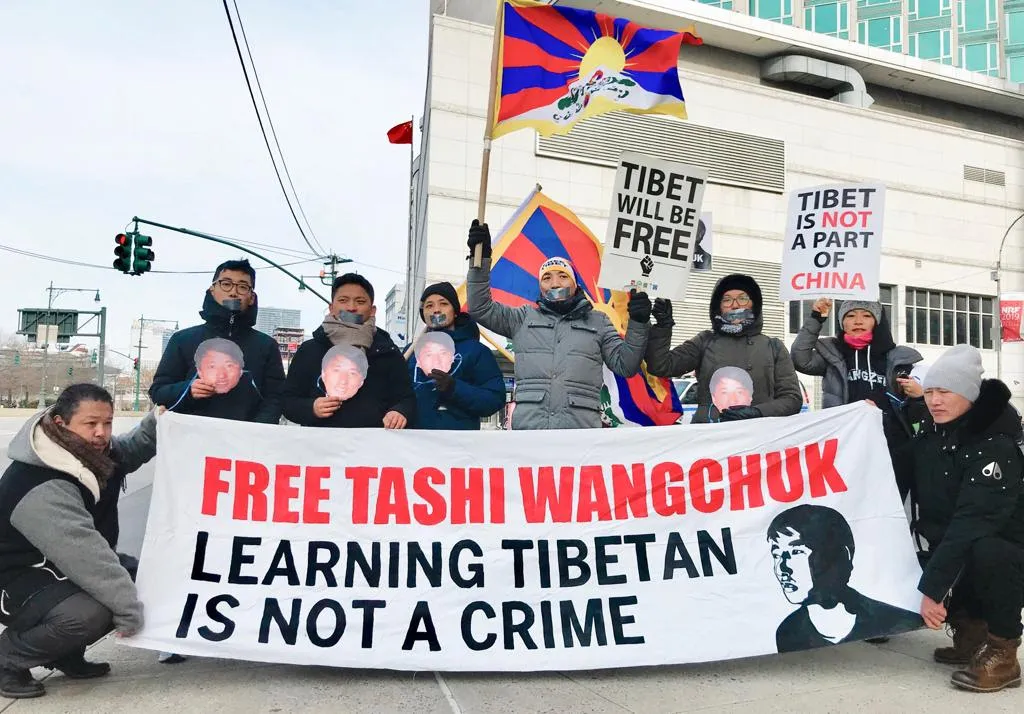 Stand with Tashi